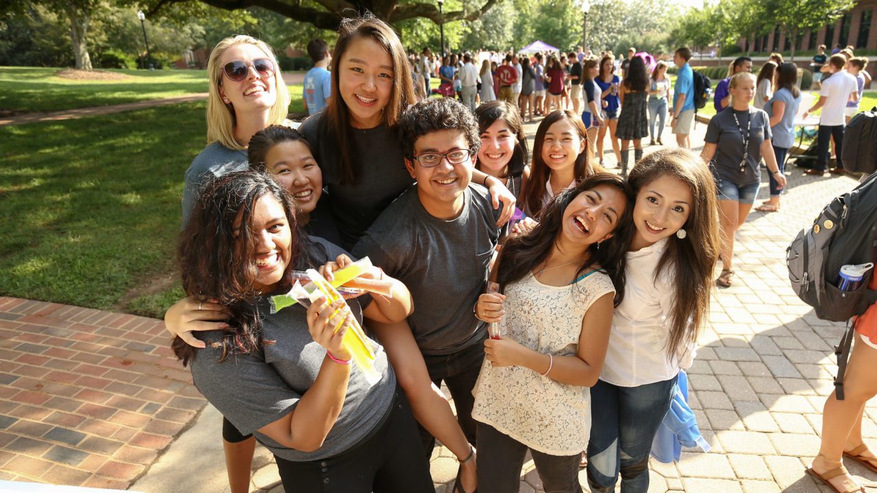 Three CUA students walking together