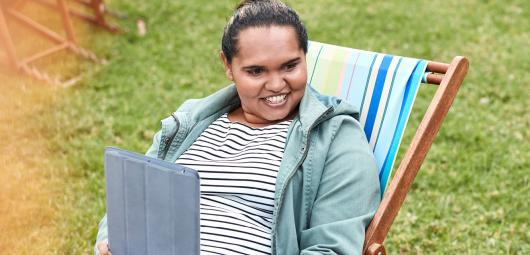 Woman sitting in a deck chair