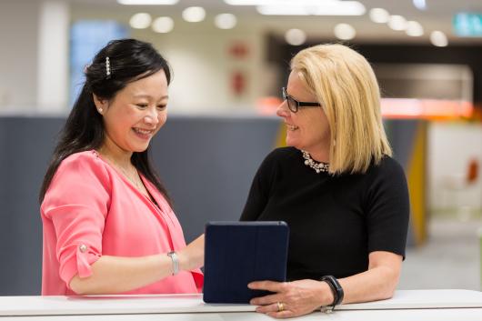 Two woman in discussion