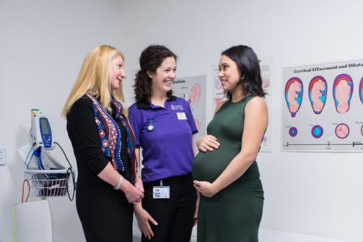 CUA midwifery student with a pregnant woman