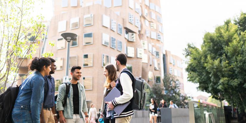 Group of students standing in front of the Chau Chak Wing Building