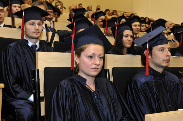 Three CUA students sitting and having a discussion